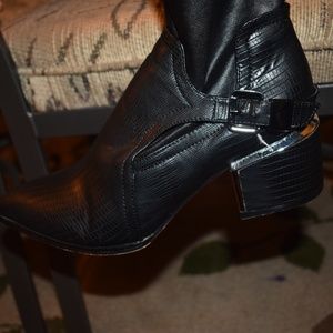 Over the knee black stretch boots with silver accents